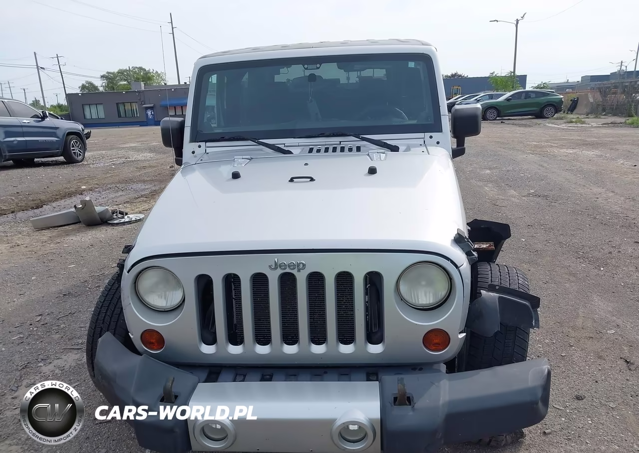 2011 Jeep Wrangler Sahara VIN:1J4AA5D1XBL585814 - 11