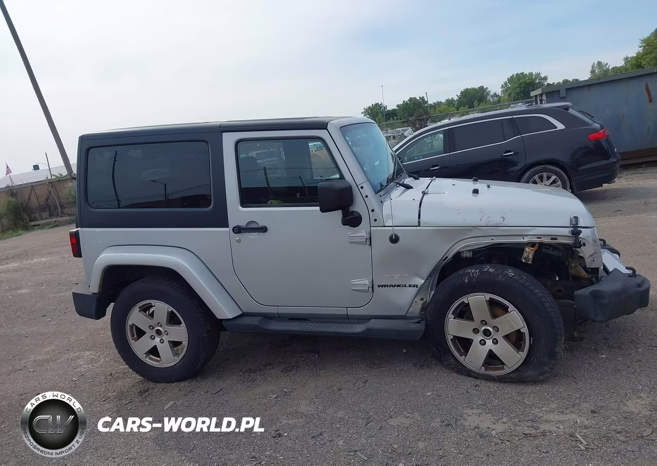 2011 Jeep Wrangler Sahara VIN:1J4AA5D1XBL585814 - 12