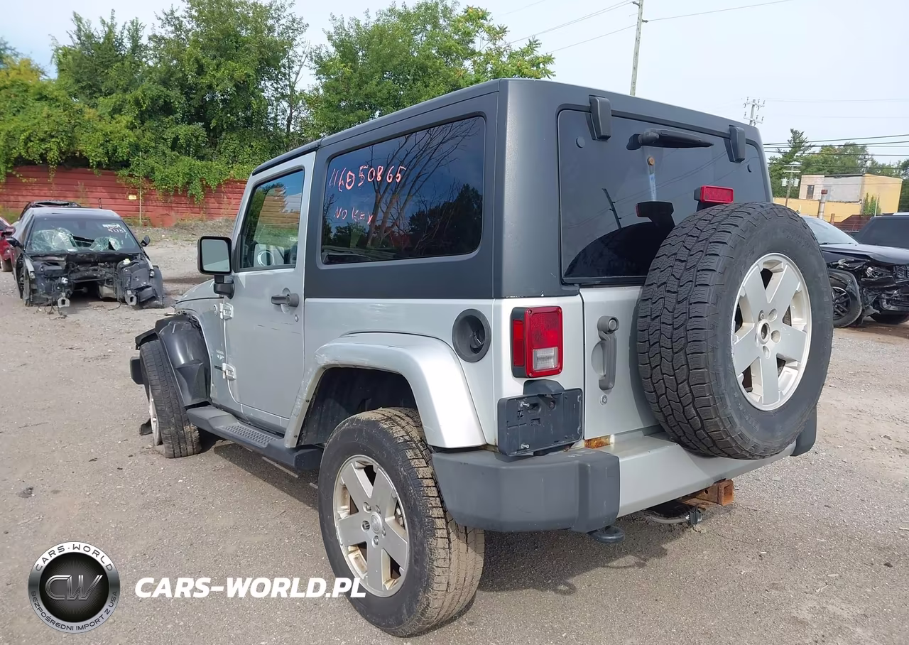 2011 Jeep Wrangler Sahara VIN:1J4AA5D1XBL585814 - 3