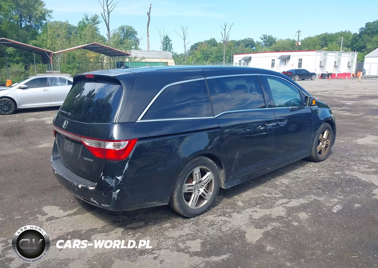 2011 Honda Odyssey Touring-Touring Elite VIN:5FNRL5H91BB056614 - 4