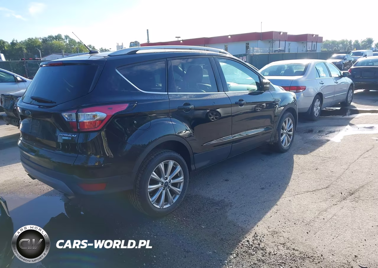 2017 Ford Escape Titanium VIN:1FMCU9JD5HUD47735 - 4