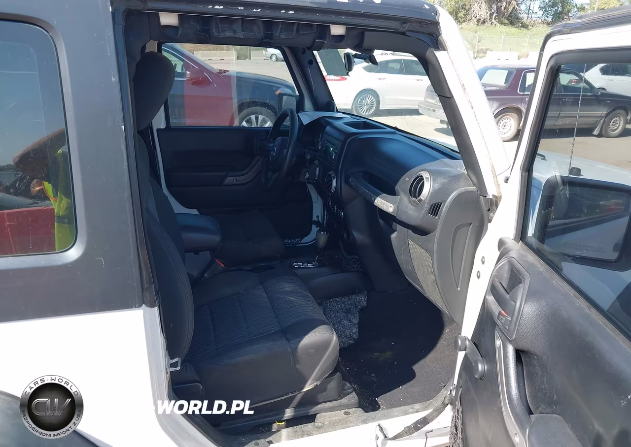 2012 Jeep Wrangler Sport VIN:1C4AJWAG2CL161324 - 5