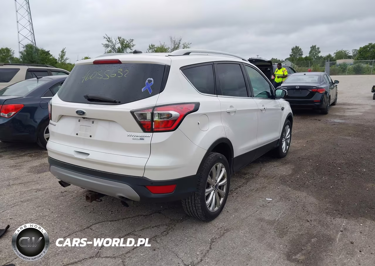 2017 Ford Escape Titanium VIN:1FMCU9J90HUA63277 - 4