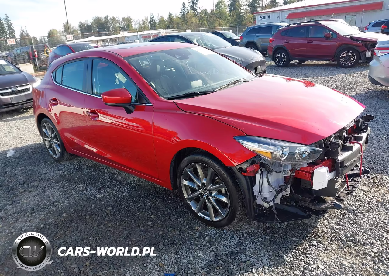 2018 Mazda Mazda3 Touring VIN:3MZBN1L32JM244945 - 1