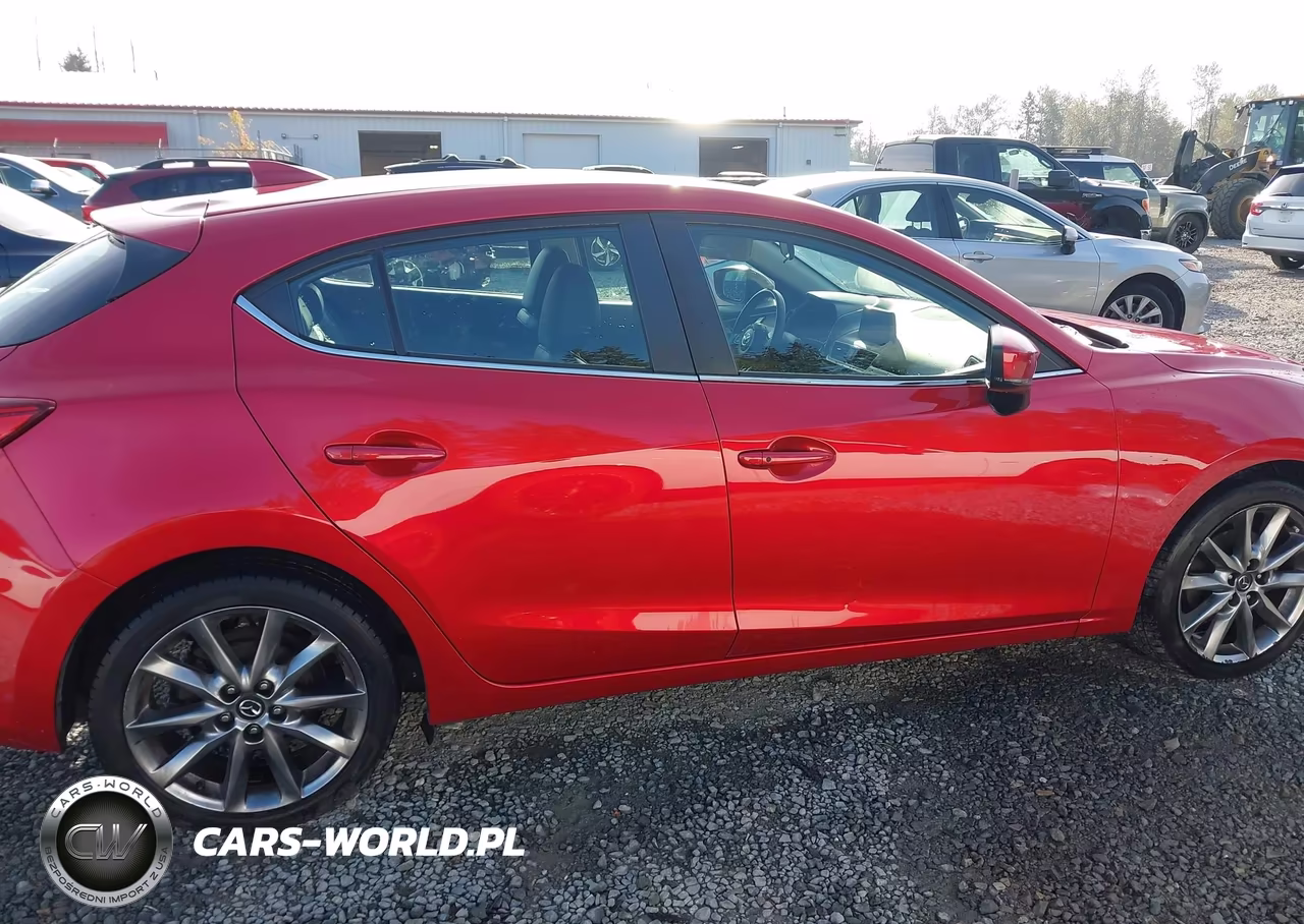 2018 Mazda Mazda3 Touring VIN:3MZBN1L32JM244945 - 14