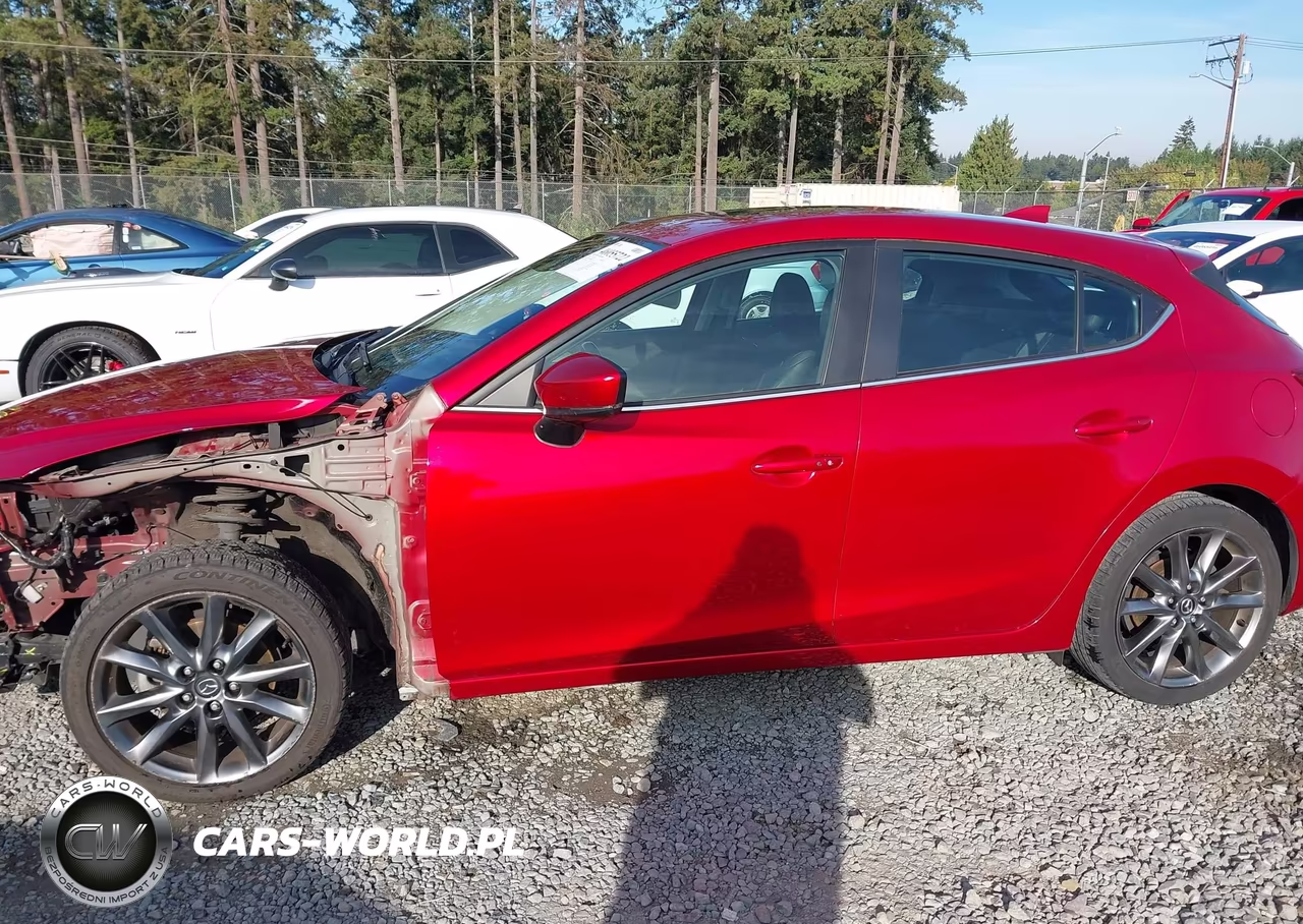 2018 Mazda Mazda3 Touring VIN:3MZBN1L32JM244945 - 15