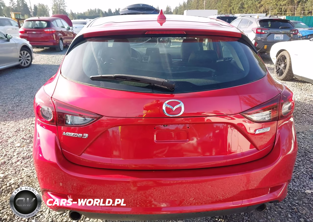 2018 Mazda Mazda3 Touring VIN:3MZBN1L32JM244945 - 17