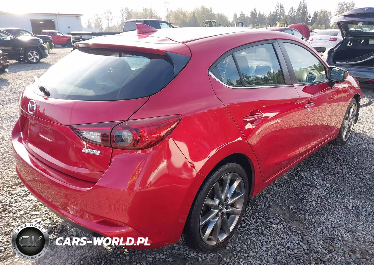2018 Mazda Mazda3 Touring VIN:3MZBN1L32JM244945 - 4