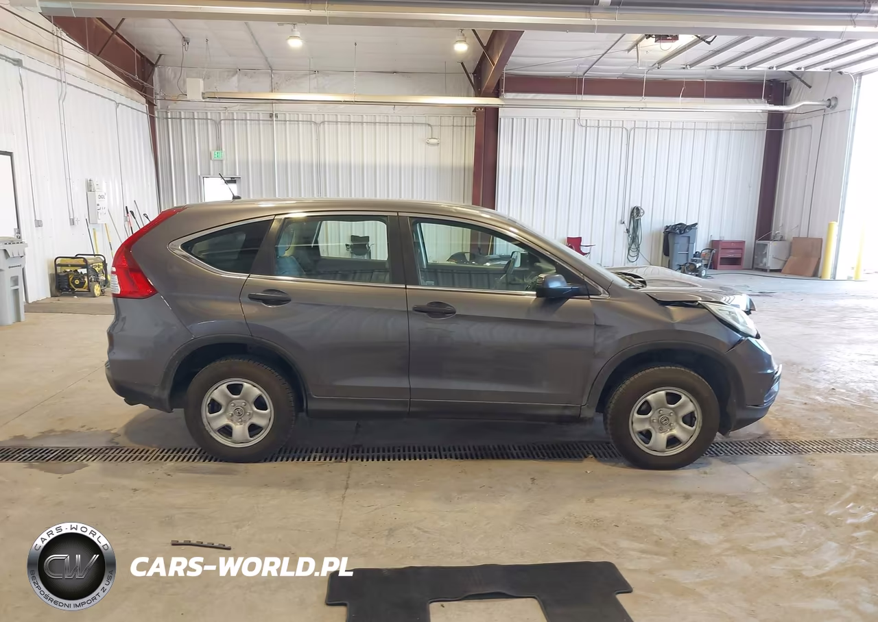 2015 Honda Cr-V Lx VIN:2HKRM4H3XFH605107 - 14