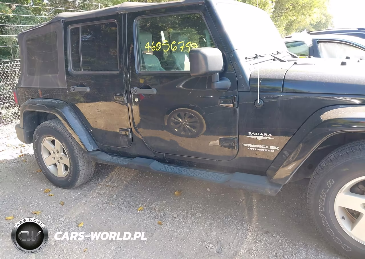 2009 Jeep Wrangler Unlimited Sahara VIN:1J4GB591X9L754076 - 13