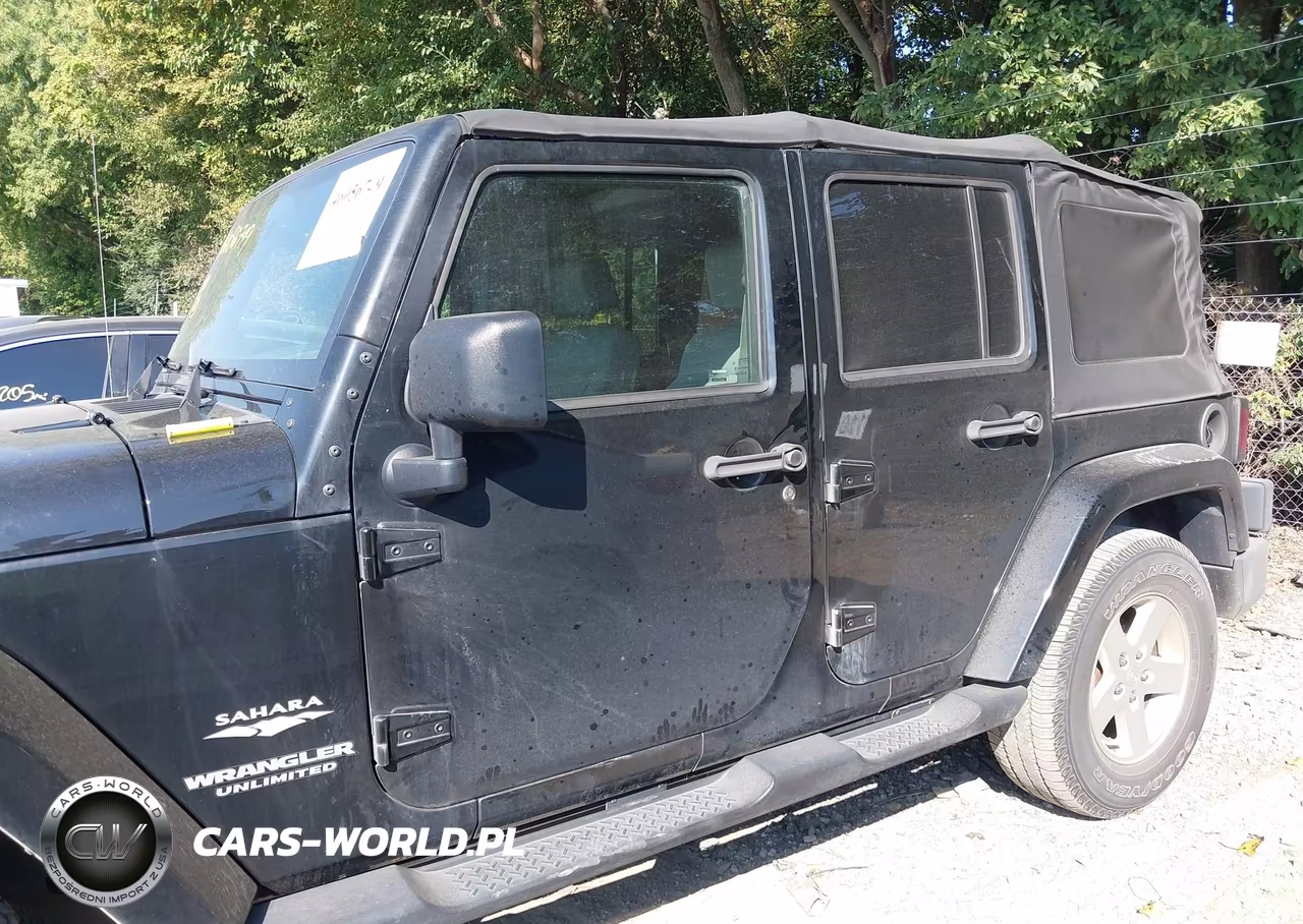 2009 Jeep Wrangler Unlimited Sahara VIN:1J4GB591X9L754076 - 14