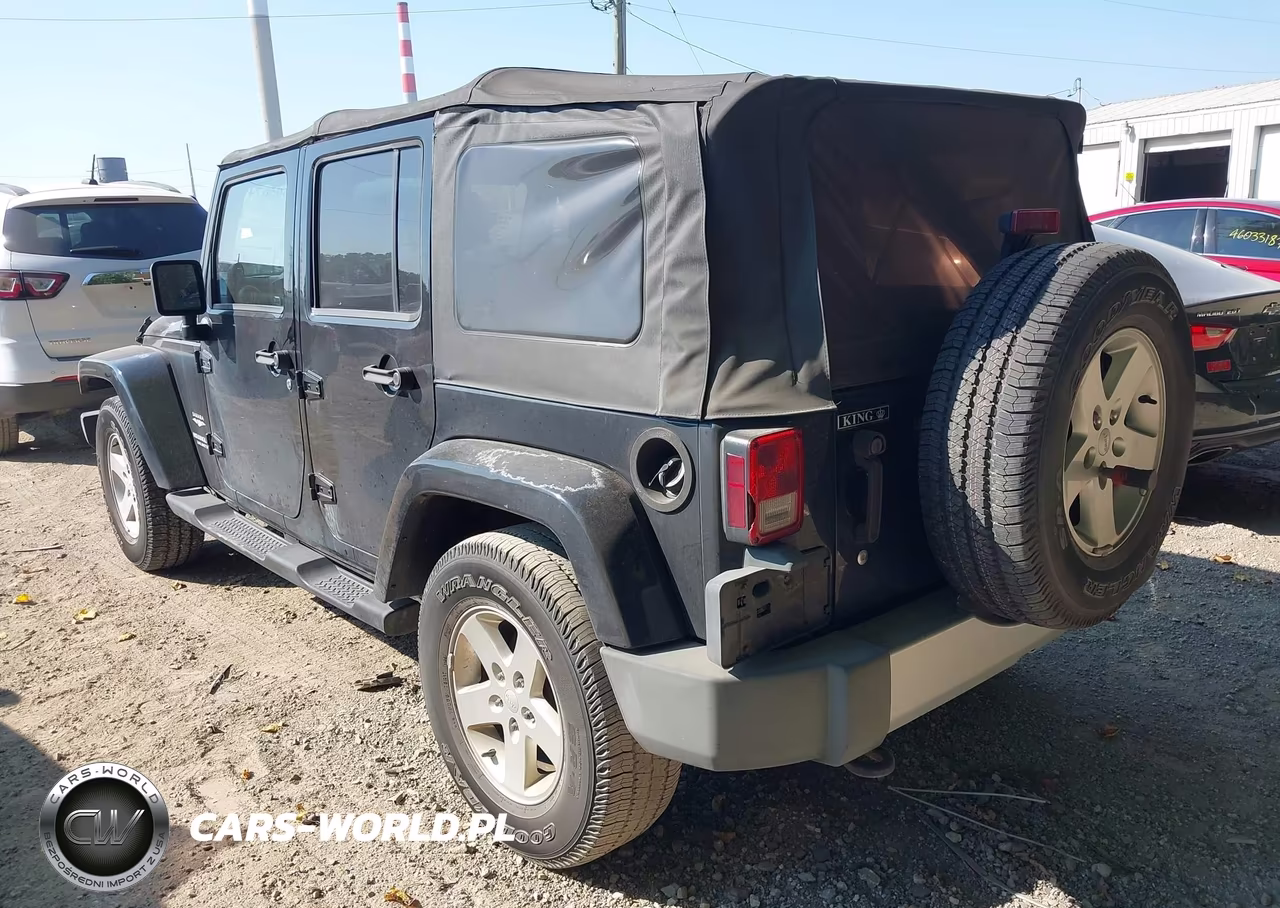 2009 Jeep Wrangler Unlimited Sahara VIN:1J4GB591X9L754076 - 3