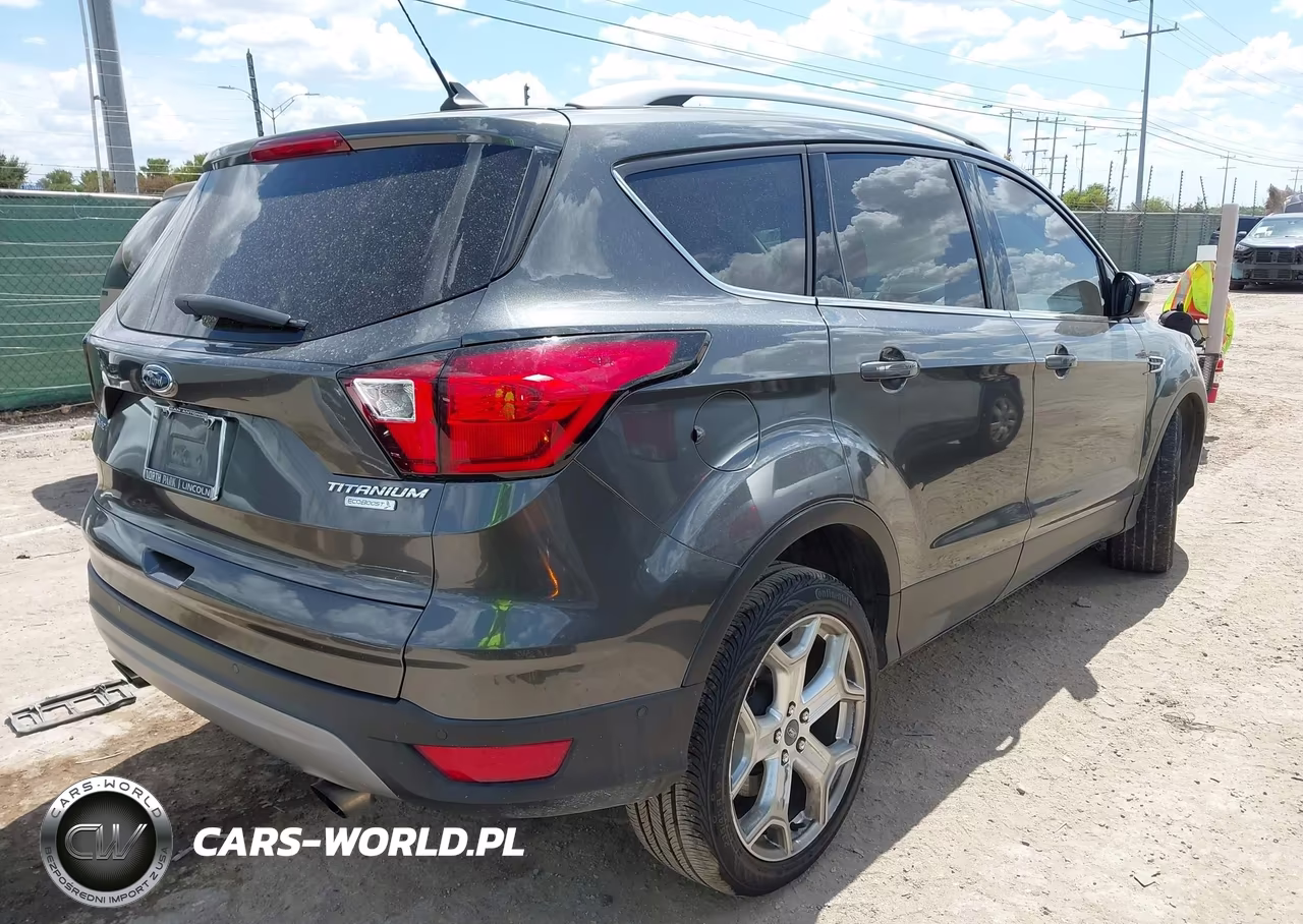 2019 Ford Escape Titanium VIN:1FMCU0J95KUB66133 - 4