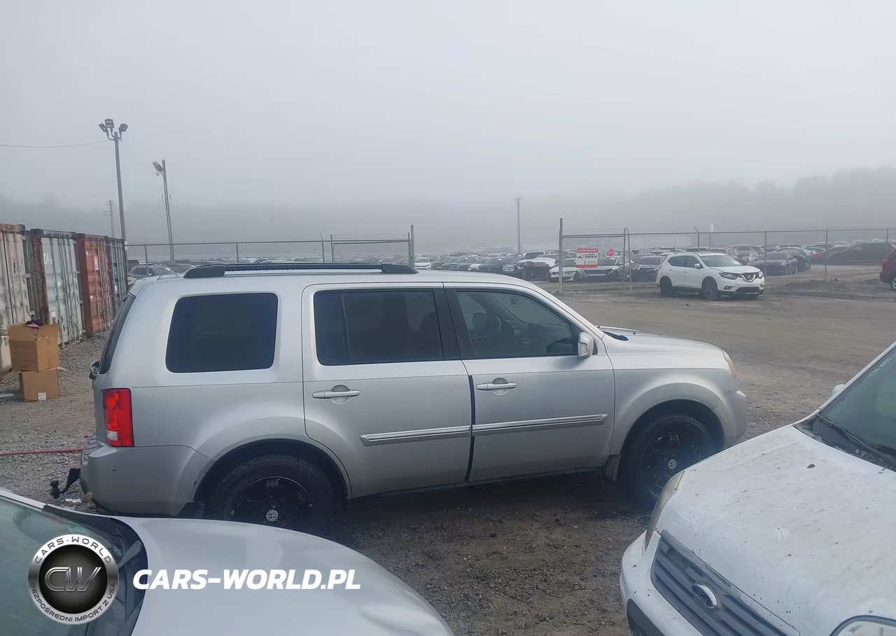 2011 Honda Pilot Touring VIN:5FNYF3H96BB002412 - 13