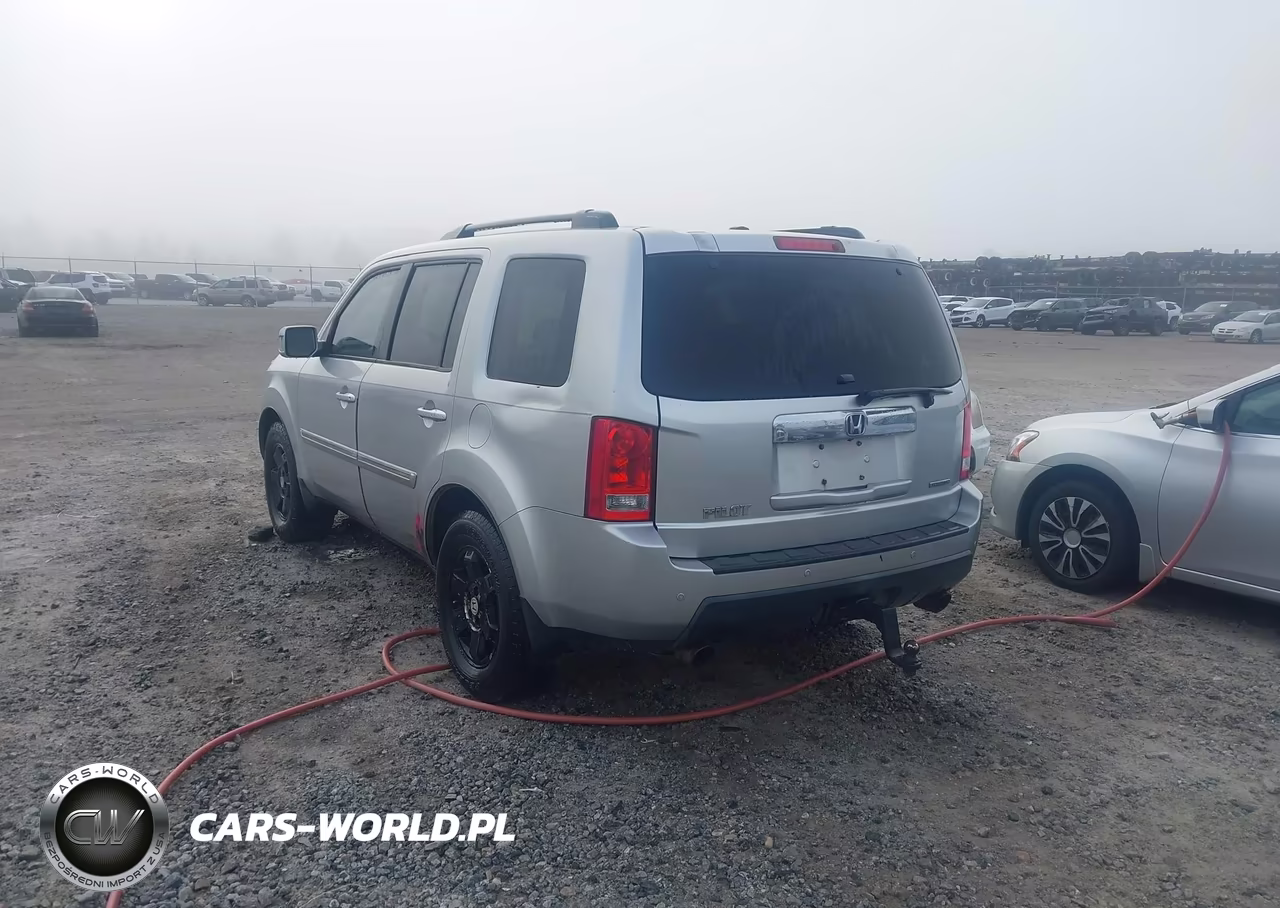 2011 Honda Pilot Touring VIN:5FNYF3H96BB002412 - 3