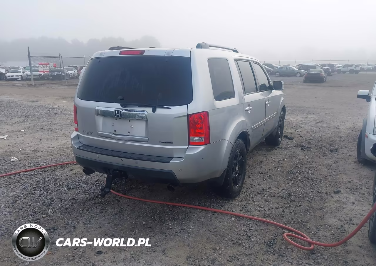 2011 Honda Pilot Touring VIN:5FNYF3H96BB002412 - 4