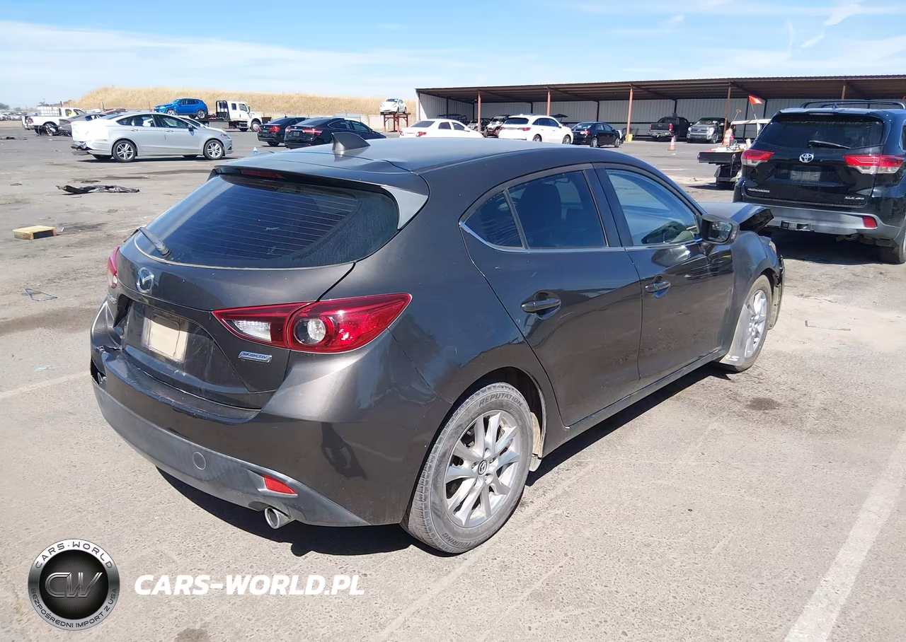 2014 Mazda Mazda3 I Grand Touring VIN:JM1BM1M71E1208609 - 4