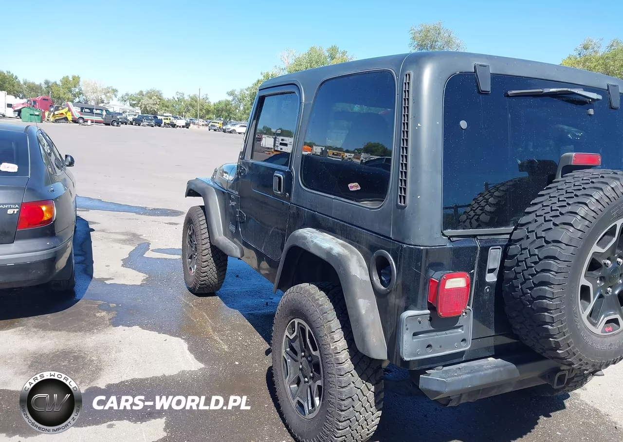 1999 Jeep Wrangler Sport VIN:1J4FY19S7XP427992 - 3
