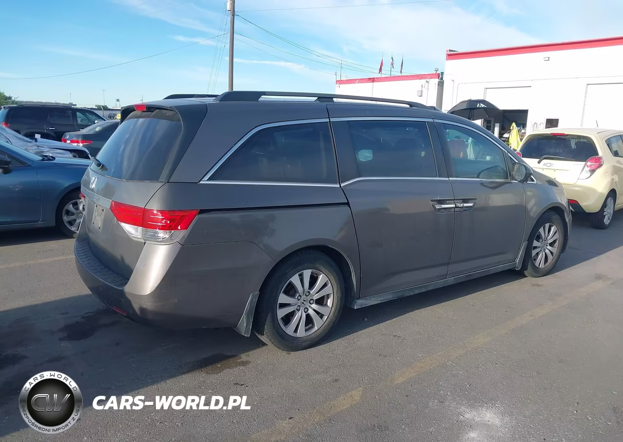 2014 Honda Odyssey VIN:5FNRL5H61EB067011 - 4