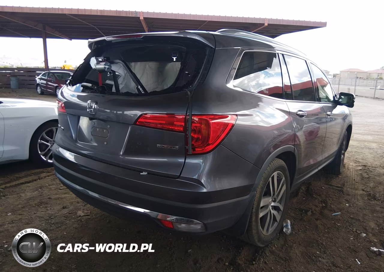 2017 Honda Pilot Touring VIN:5FNYF5H97HB004027 - 4