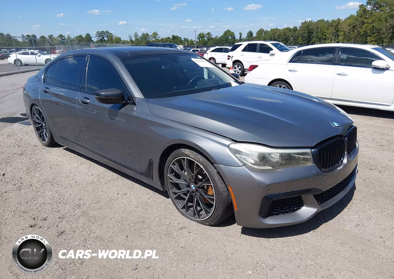 2016 BMW 740I VIN:WBA7E2C57GG504630 - 1