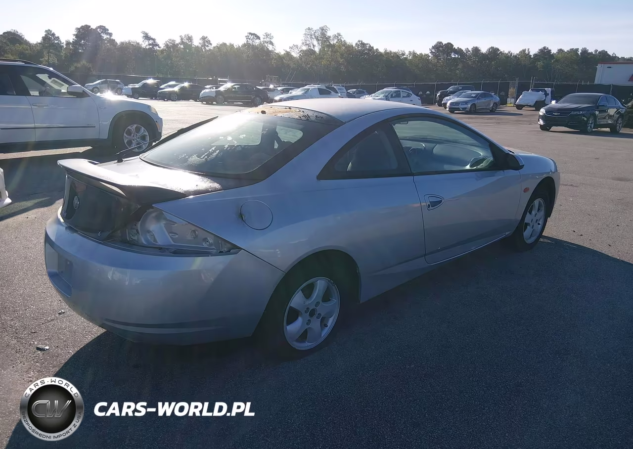 2000 Mercury Cougar V6 VIN:1ZWHT61L7Y5609857 - 4