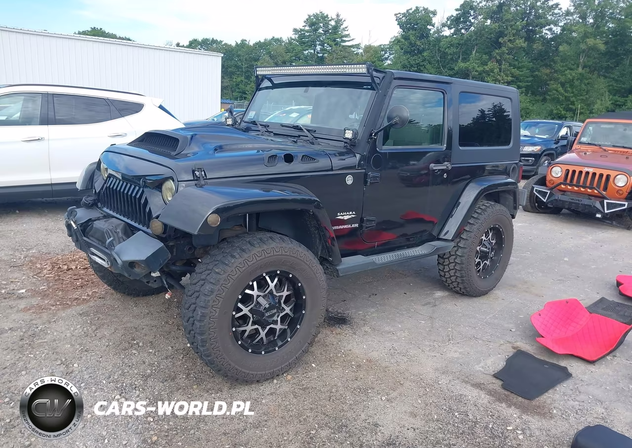 2010 Jeep Wrangler Sahara VIN:1J4GA5D17AL109576 - 2