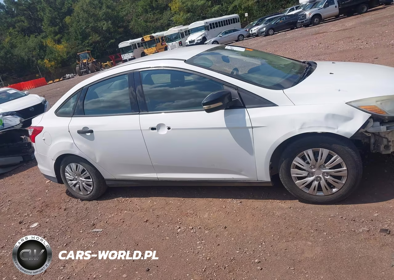 2014 Ford Focus S VIN:1FADP3E29EL337058 - 13