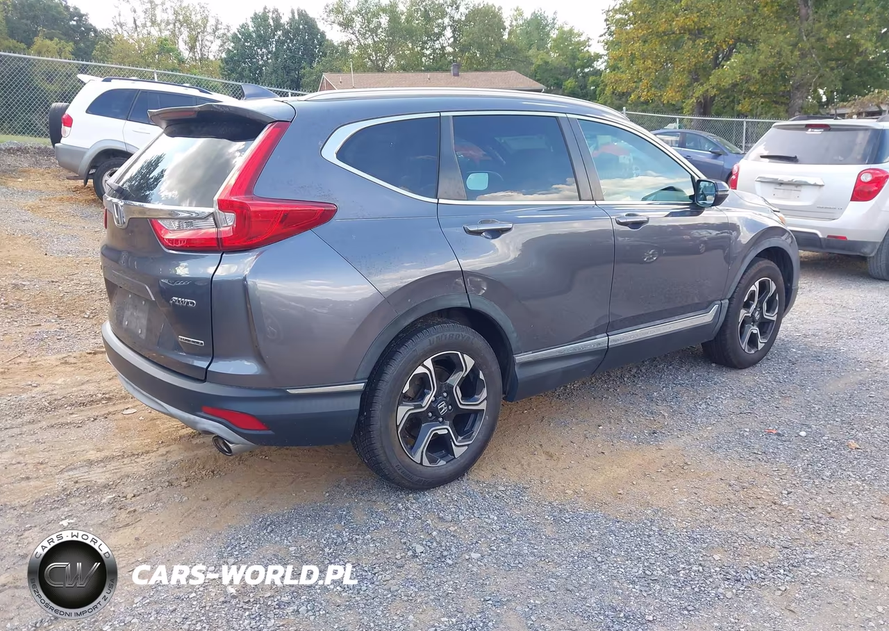 2017 Honda Cr-V Touring VIN:2HKRW2H90HH670070 - 4
