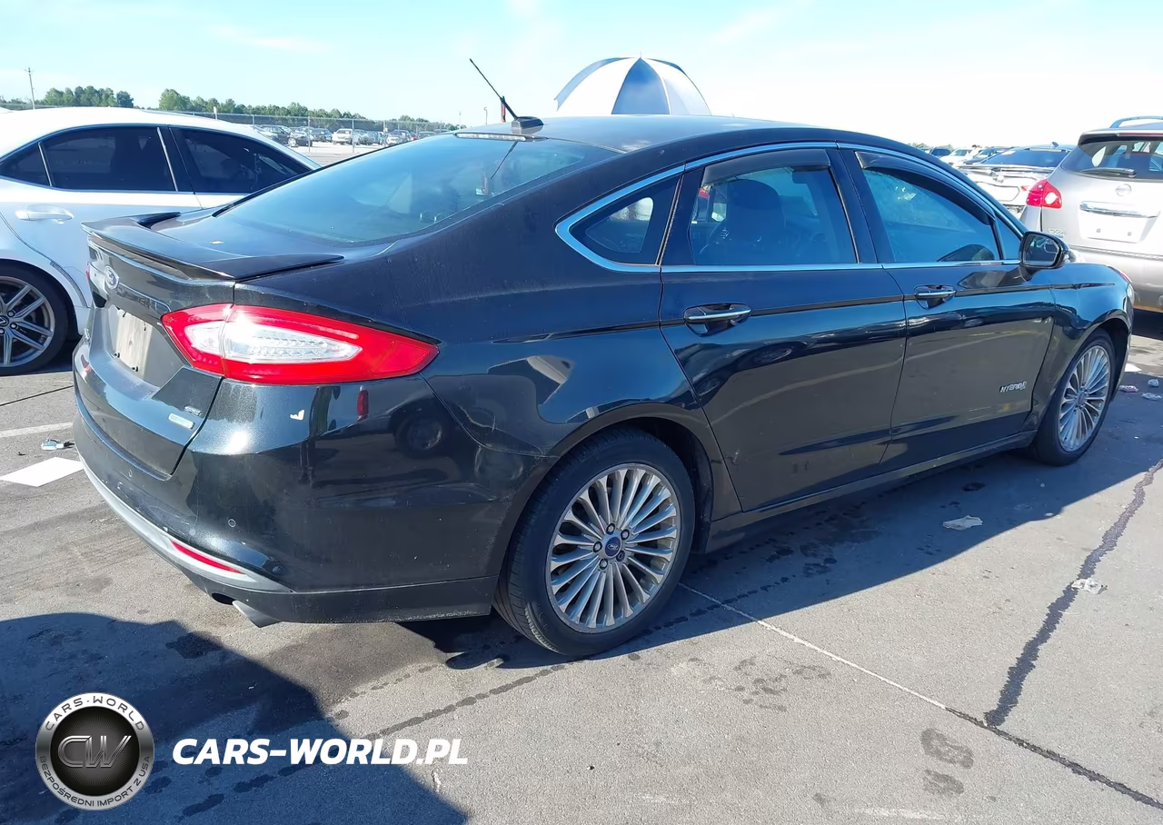 2014 Ford Fusion Hybrid Titanium VIN:3FA6P0RU9ER126169 - 4