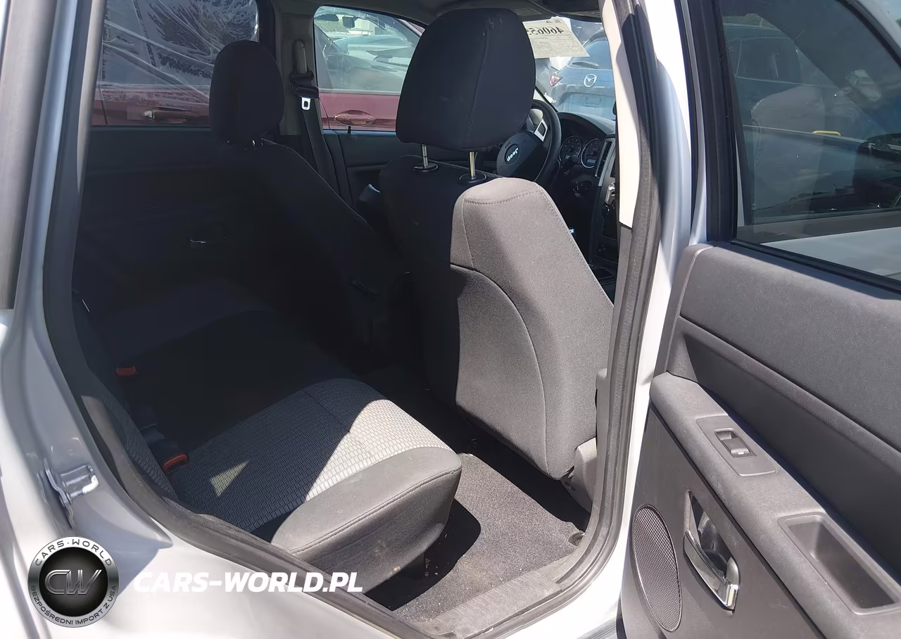 2009 Jeep Grand Cherokee Laredo VIN:1J8GR48K49C525679 - 8