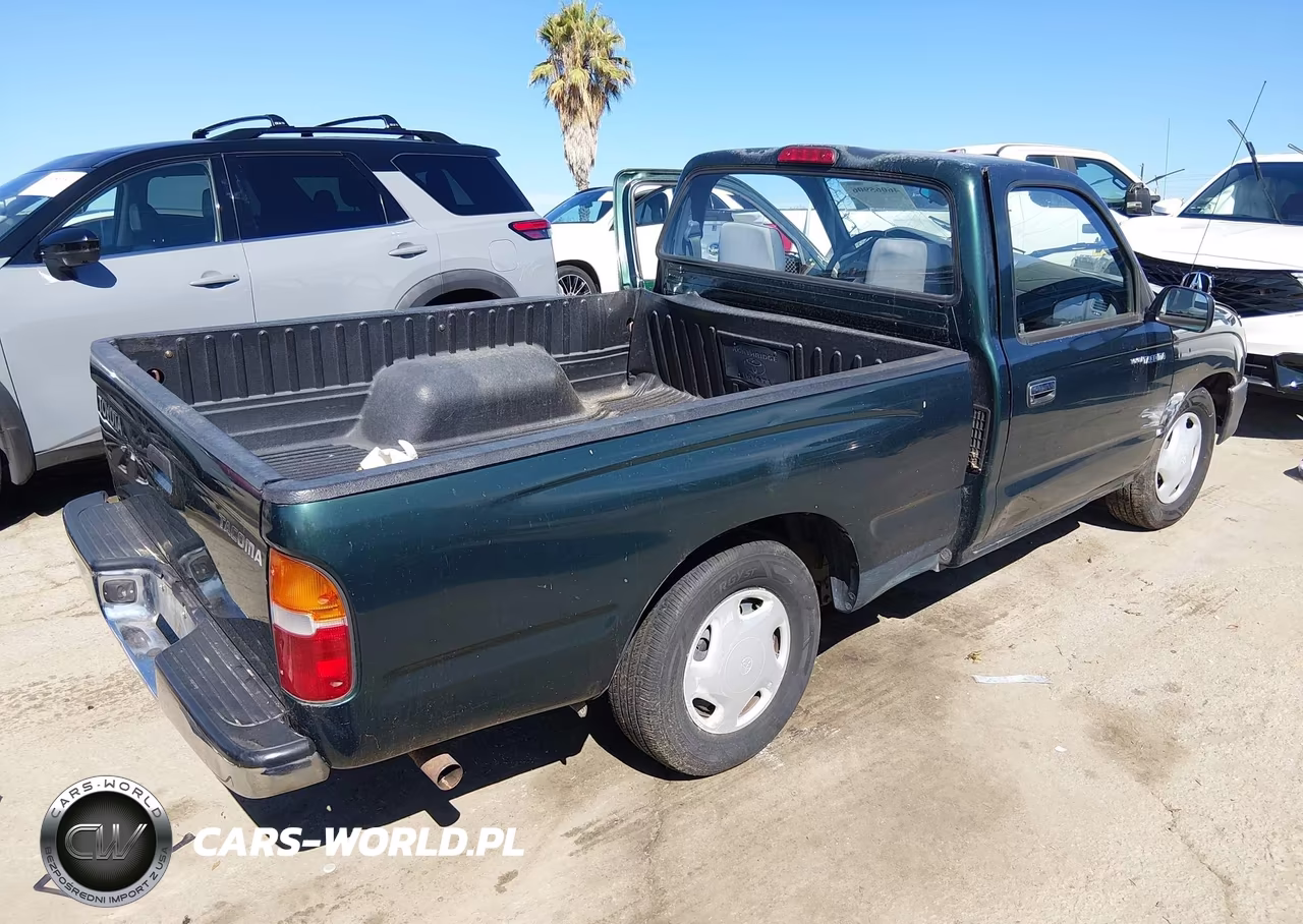 1999 Toyota Tacoma VIN:4TANL42NXXZ407144 - 4