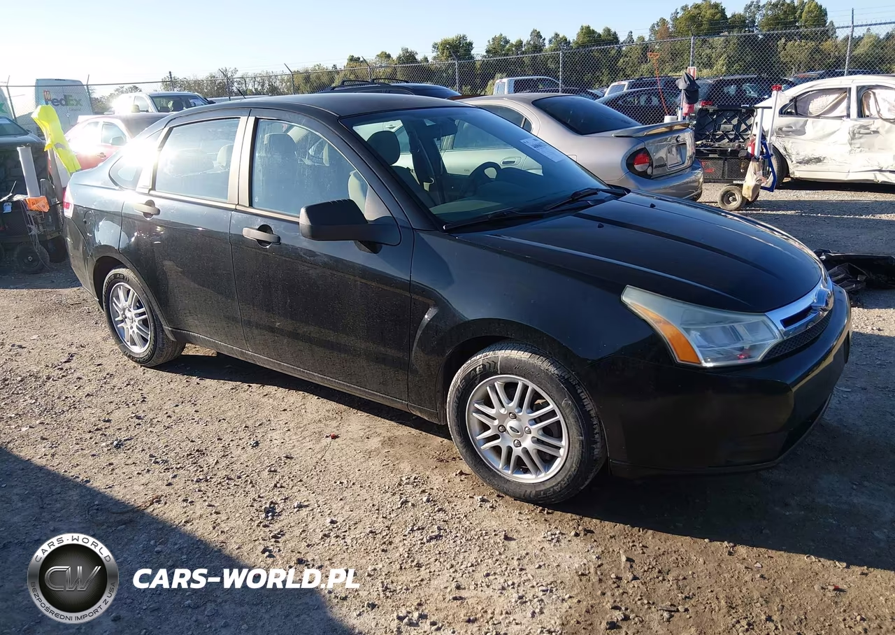 2009 Ford Focus Se VIN:1FAHP35N59W120638 - 1