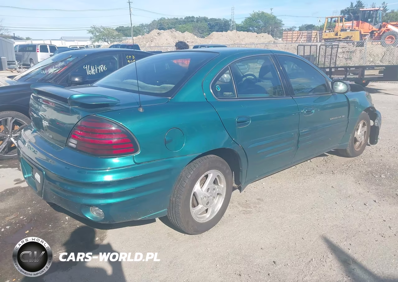 1999 Pontiac Grand Am Se1 VIN:1G2NE52E6XC561894 - 4