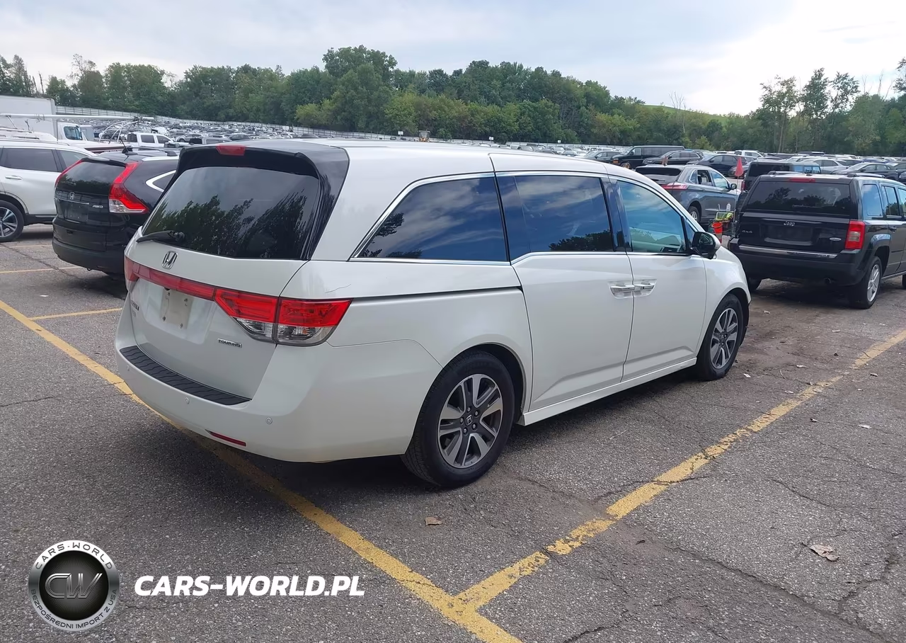 2016 Honda Odyssey Touring-Touring Elite VIN:5FNRL5H96GB012907 - 4