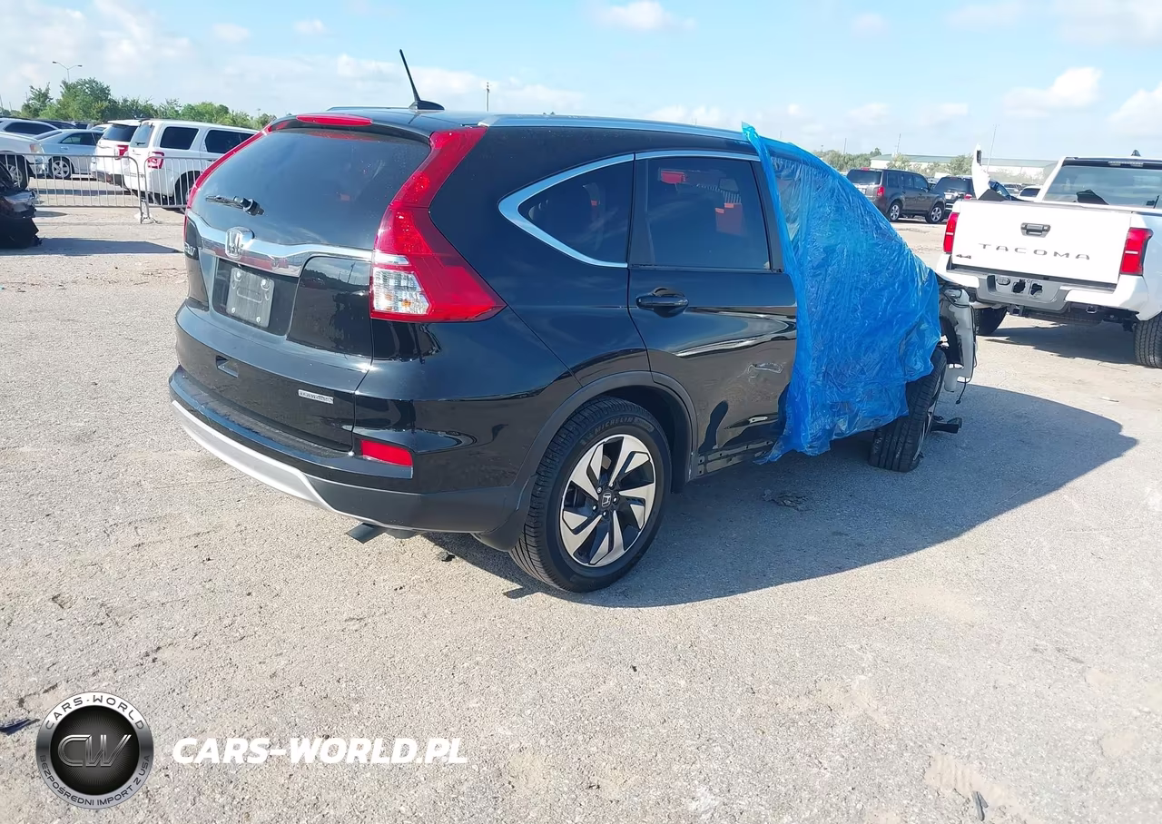 2015 Honda Cr-V Touring VIN:5J6RM3H9XFL008401 - 4