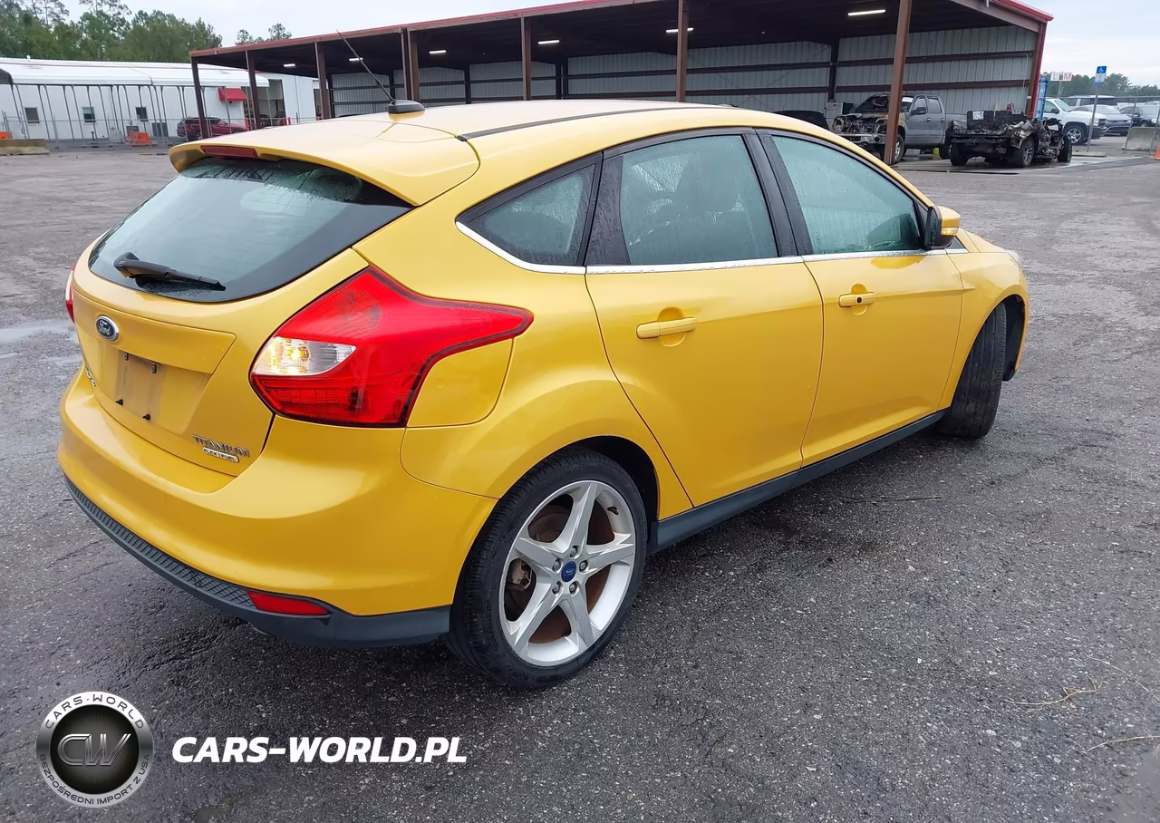 2012 Ford Focus Titanium VIN:1FAHP3N29CL368308 - 4