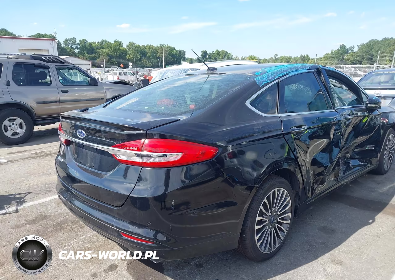 2017 Ford Fusion Energi Titanium VIN:3FA6P0SU5HR273569 - 4