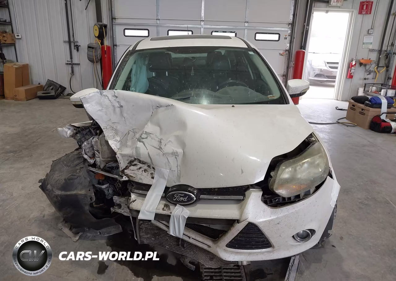 2013 Ford Focus Titanium VIN:1FADP3J27DL263384 - 13
