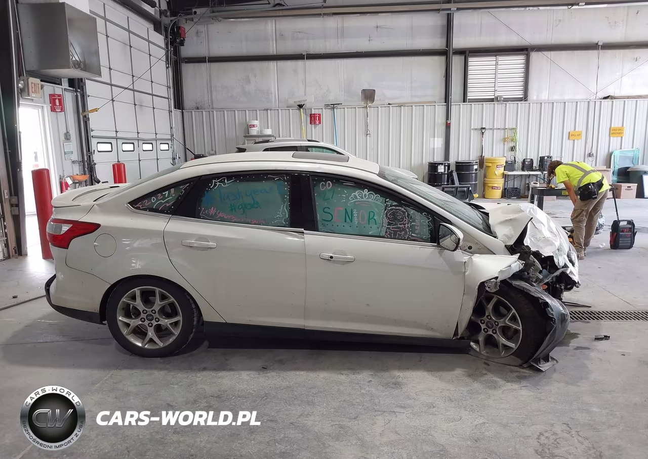 2013 Ford Focus Titanium VIN:1FADP3J27DL263384 - 14