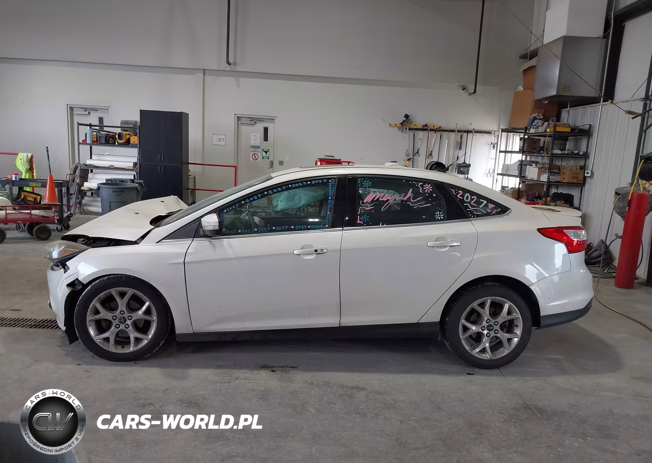 2013 Ford Focus Titanium VIN:1FADP3J27DL263384 - 15