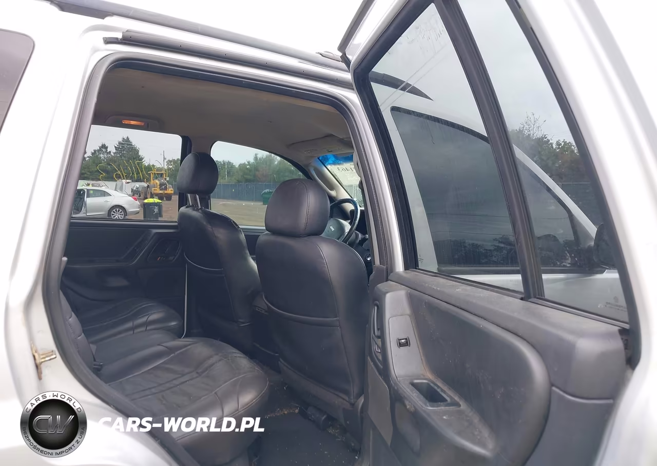 2002 Jeep Grand Cherokee Laredo VIN:1J4GW48S72C329008 - 8