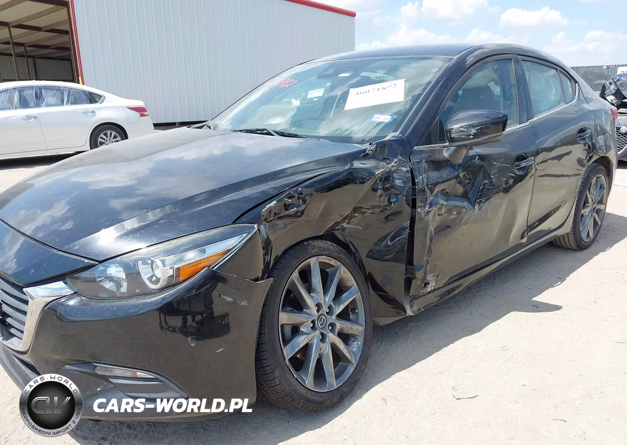 2018 Mazda Mazda3 Touring VIN:3MZBN1V39JM208232 - 6