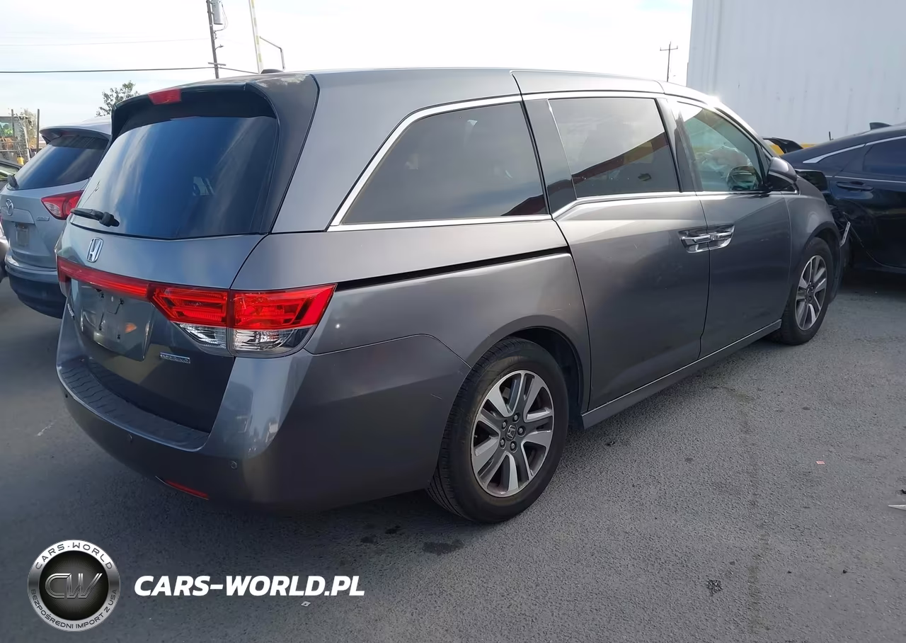 2014 Honda Odyssey Touring-Touring Elite VIN:5FNRL5H99EB117681 - 4