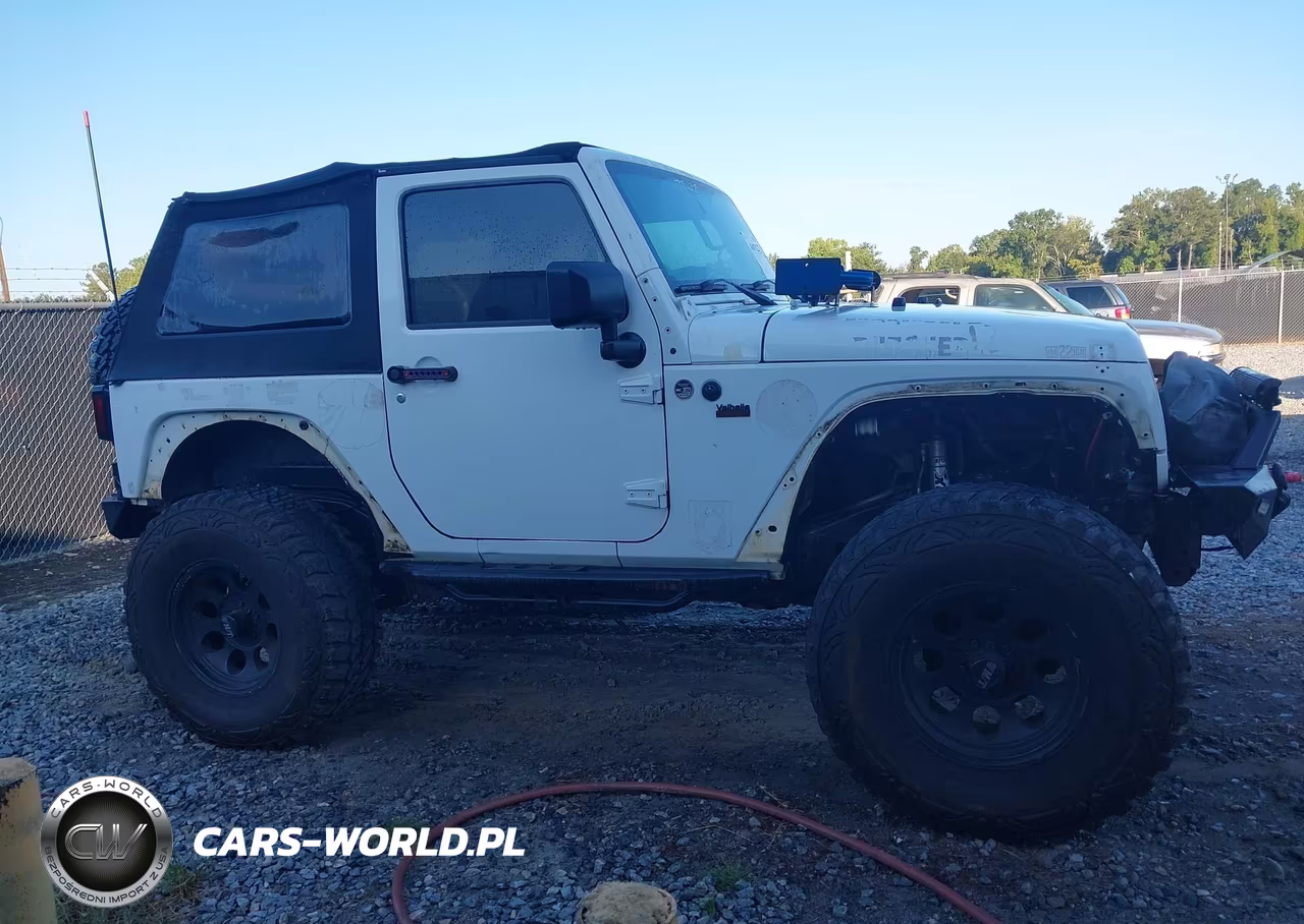 2011 Jeep Wrangler Sport VIN:1J4AA2D14BL620975 - 13