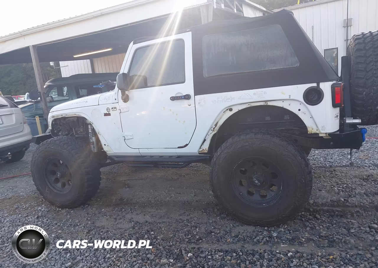 2011 Jeep Wrangler Sport VIN:1J4AA2D14BL620975 - 14