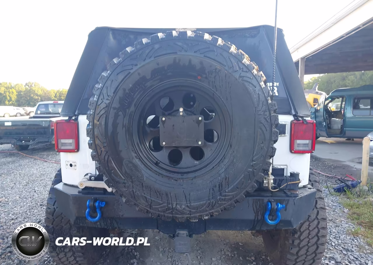 2011 Jeep Wrangler Sport VIN:1J4AA2D14BL620975 - 16