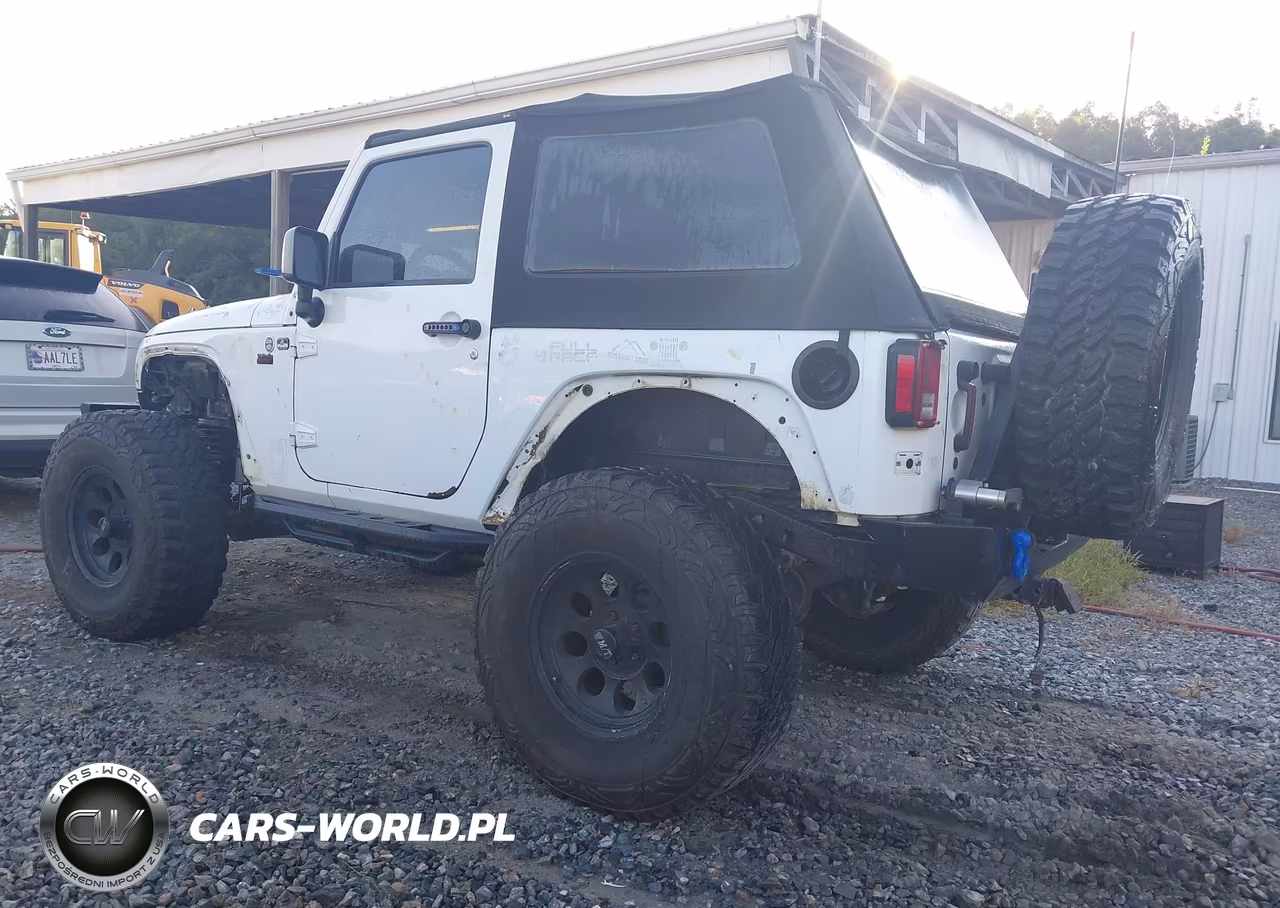 2011 Jeep Wrangler Sport VIN:1J4AA2D14BL620975 - 3