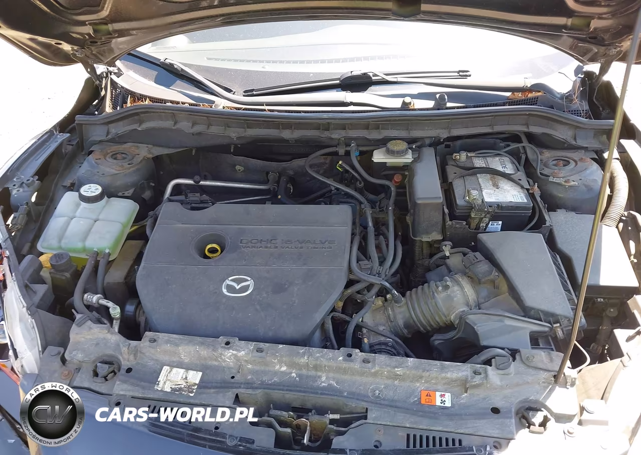 2011 Mazda Mazda3 I Touring VIN:JM1BL1VG2B1438107 - 10