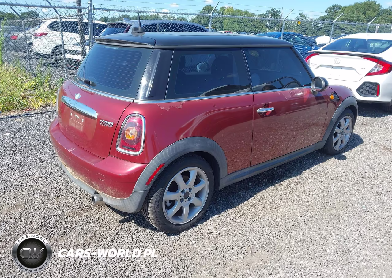 2009 Mini Cooper VIN:WMWMF33599TW72334 - 4
